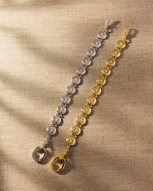 Raven James Alba Bracelet Set in sterling silver and 18ct gold plated brass - vintage button-inspired disc bracelets with star-set cubic zirconia and signature oval clasp
