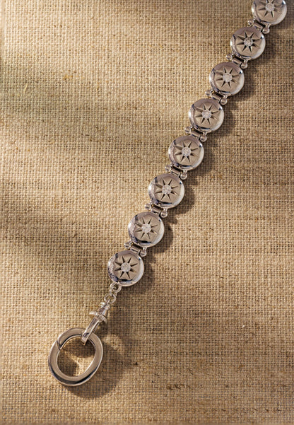 Raven James Alba Bracelet in 925 sterling silver - vintage button-inspired disc bracelet with star-set cubic zirconia and signature oval clasp
