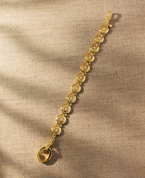 Raven James Alba Bracelet in 18ct gold plated brass - vintage button-inspired disc bracelet with star-set cubic zirconia and signature oval clasp