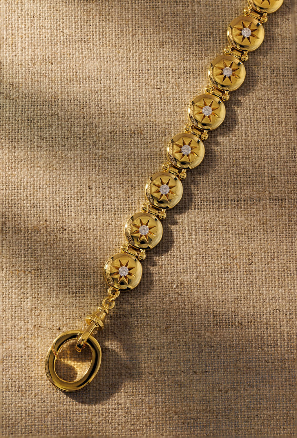 Raven James Alba Bracelet in 18ct gold plated brass - vintage button-inspired disc bracelet with star-set cubic zirconia and signature oval clasp