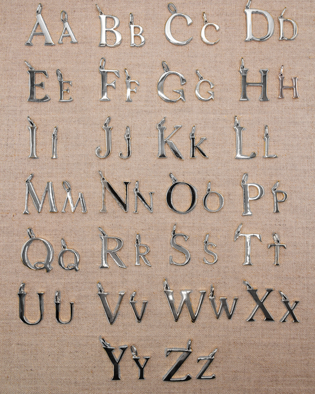 Solid silver alphabet initial pendants