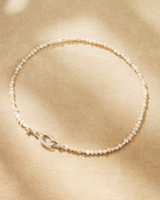 Aura baroque pearl necklace with sterling silver clasp and oval ring, designed for multiway styling and adding pendants