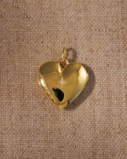 Cora gold heart locket pendant with vintage inspired starburst crystal detailing