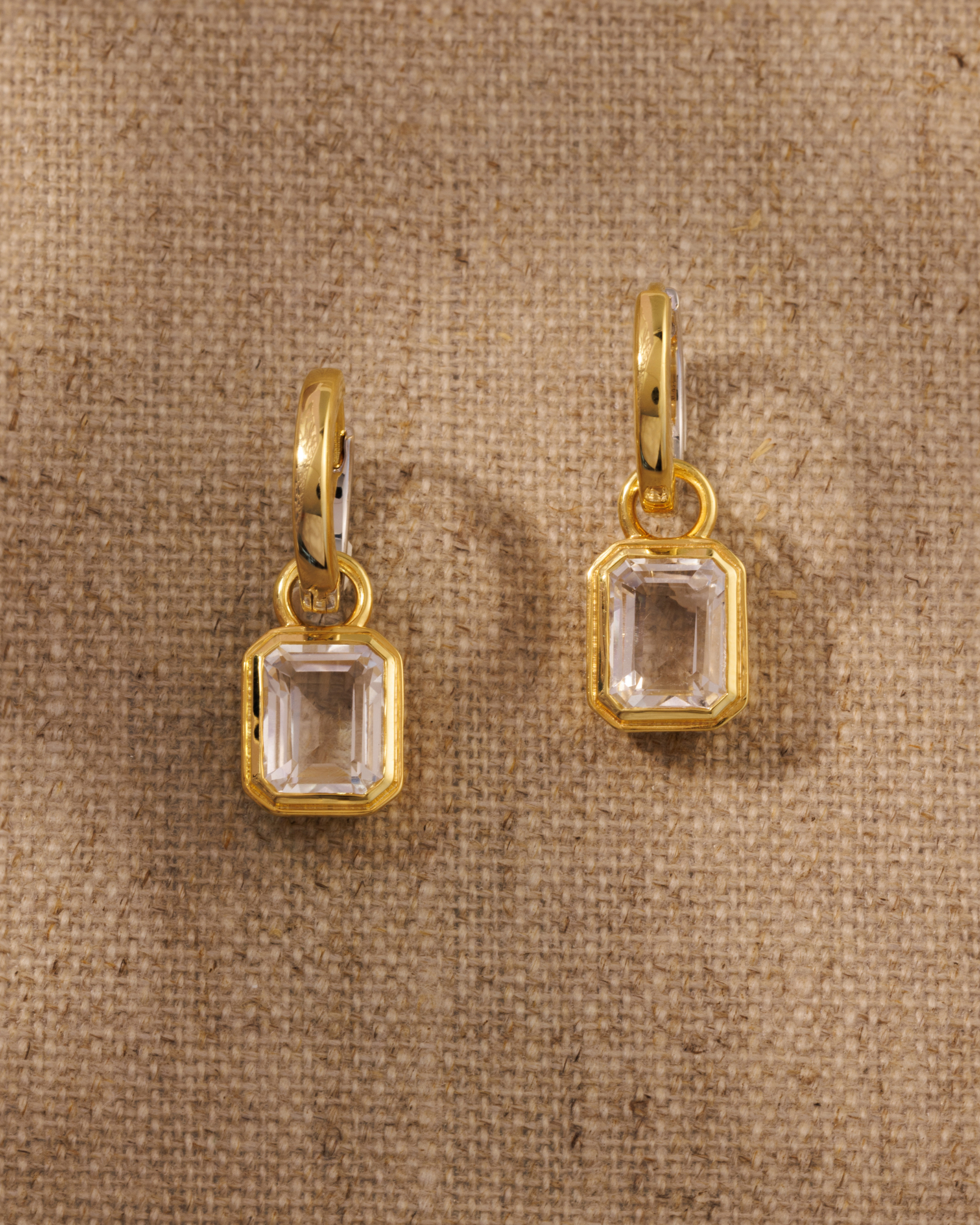 Clear quartz earring charms on Cara reversible hoop earrings
