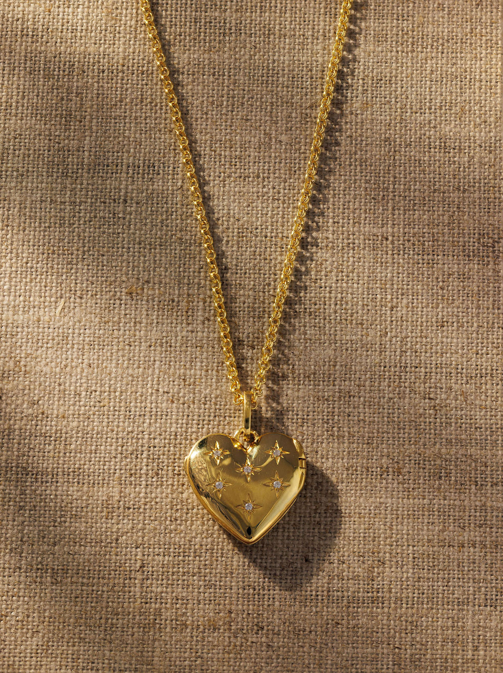 Raven James Cora Pendant on Ivy Necklace - 18ct gold plated heart locket with star-set crystals on a fine belcher chain