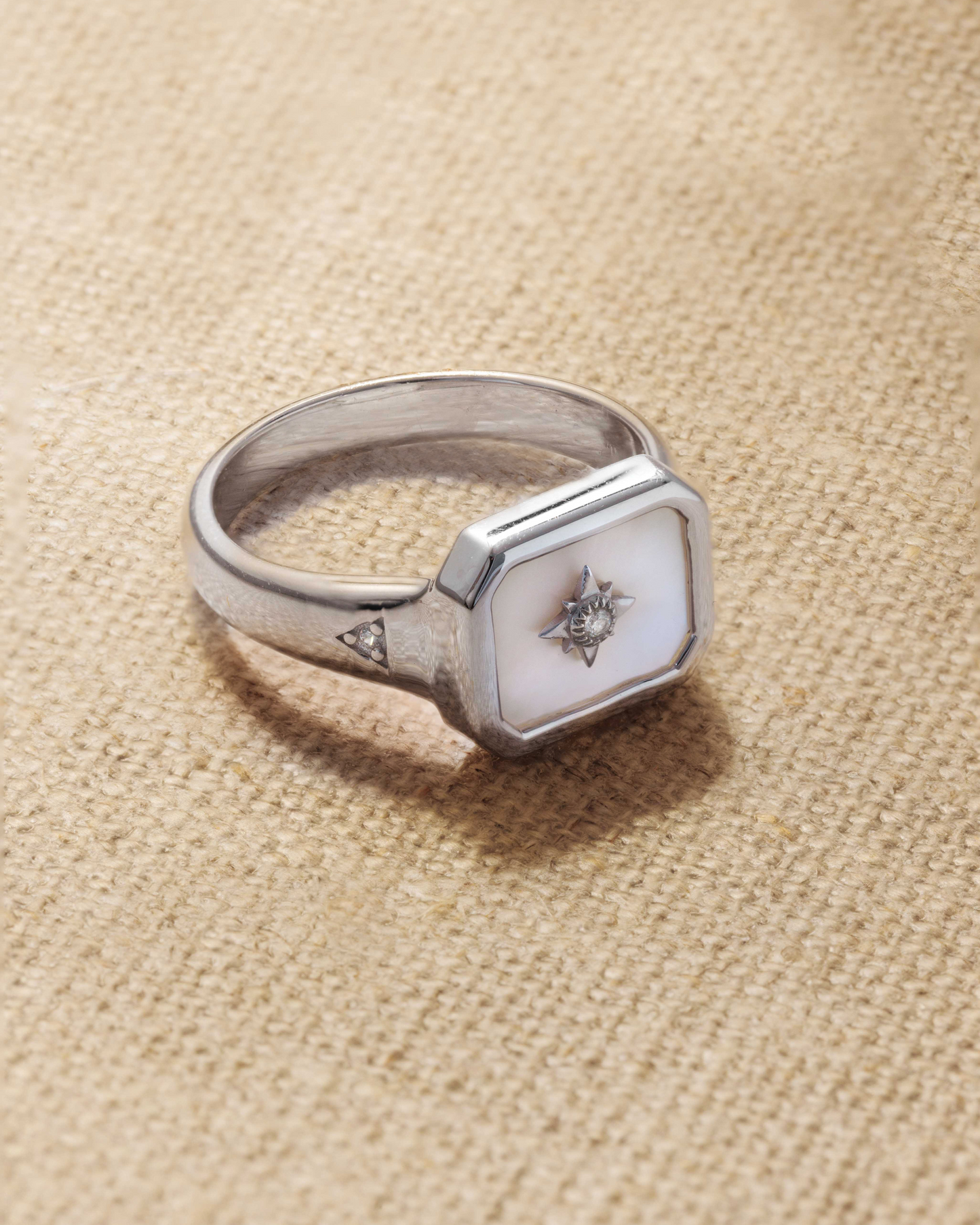 Dana solid silver signet ring with mother of pearl inlay and north star emblem