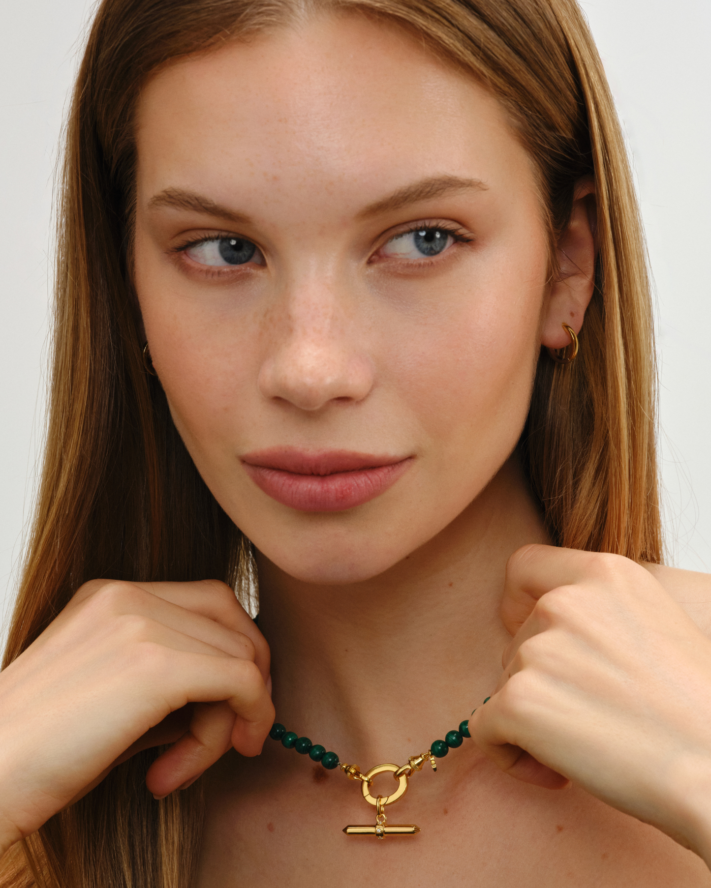 Fearne malachite beaded necklace styled with Lucy gold T-bar pendant