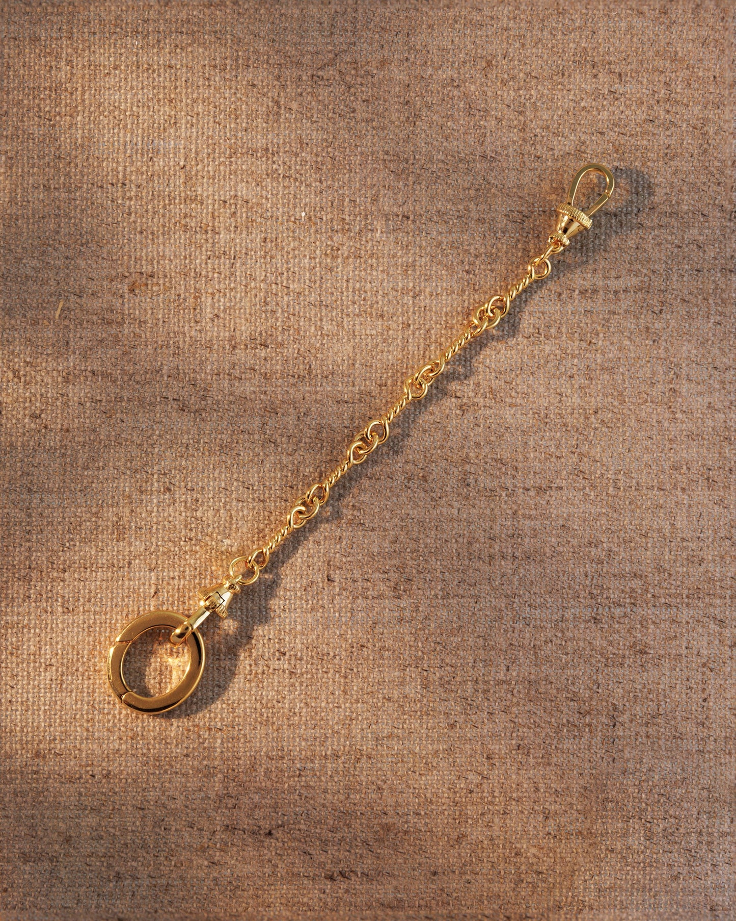Raven James ARABELLA gold horsebit chain extender, 18ct gold plated recycled brass fine chain necklace and bracelet extender with signature oval clasp