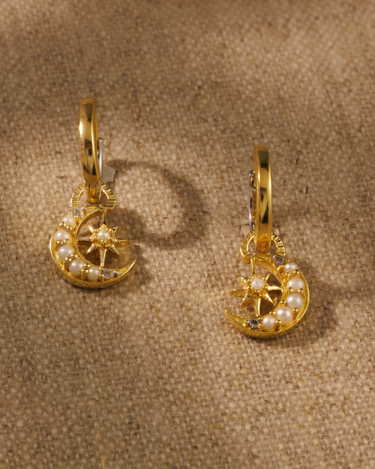 Gold moon and star charm hoop earrings with pearls and crystals on reversible gold and sterling silver hoops
