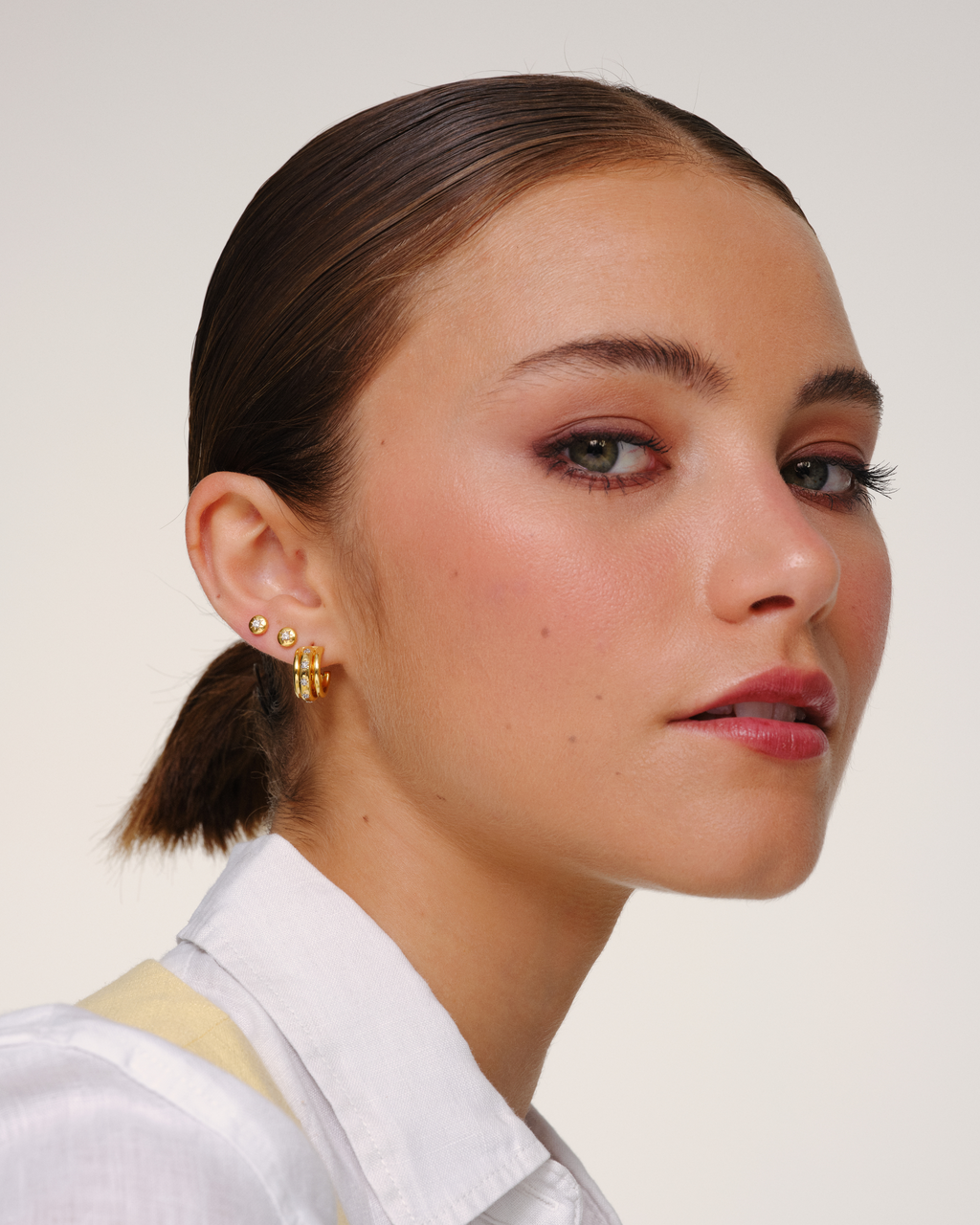 Gold hoop earrings with crystal star detailing and removable jacket, convertible multiway earrings