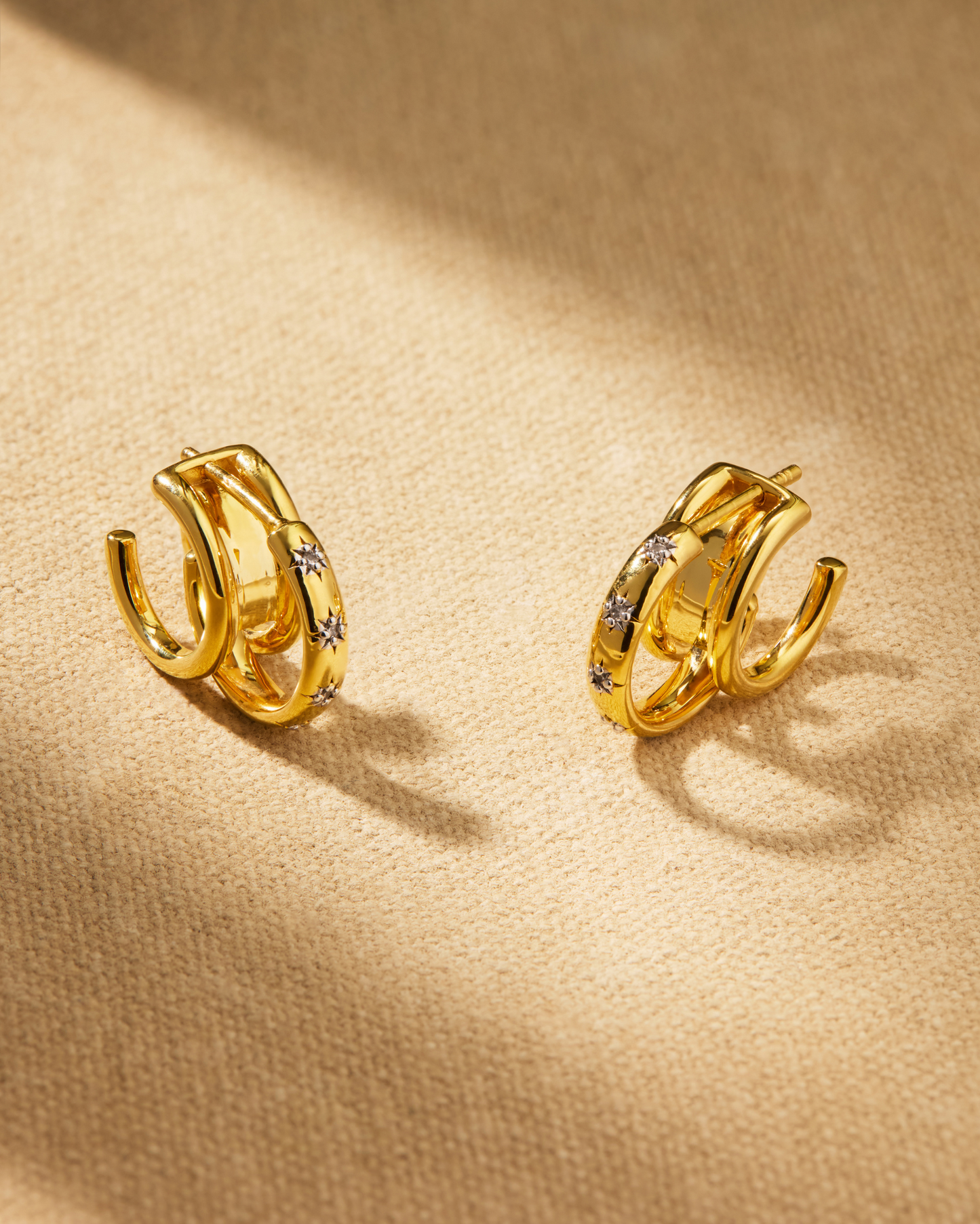 Jemima gold hoop earrings with engraved star design and detachable jacket for multiple styling options