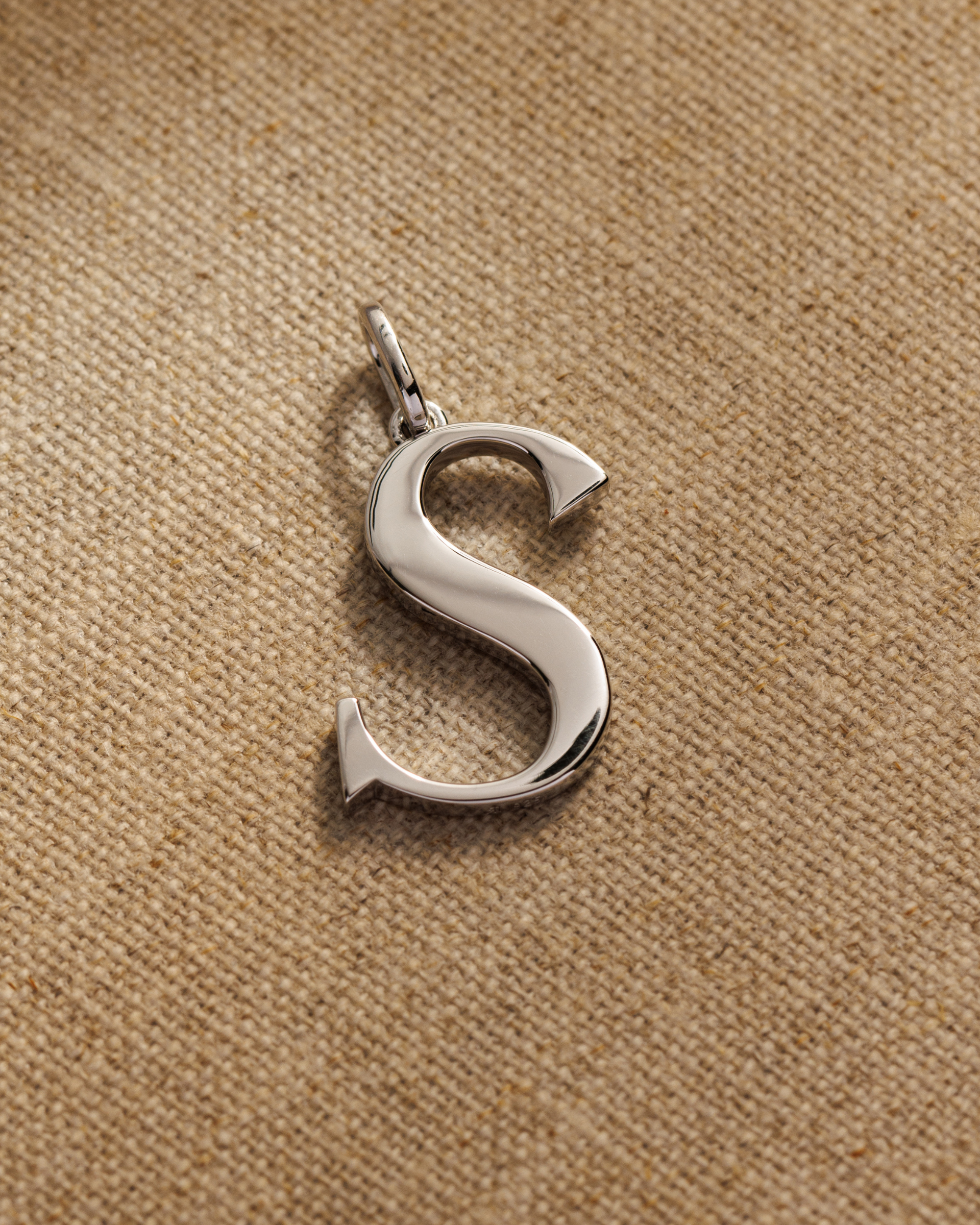 Solid silver alphabet initial pendants