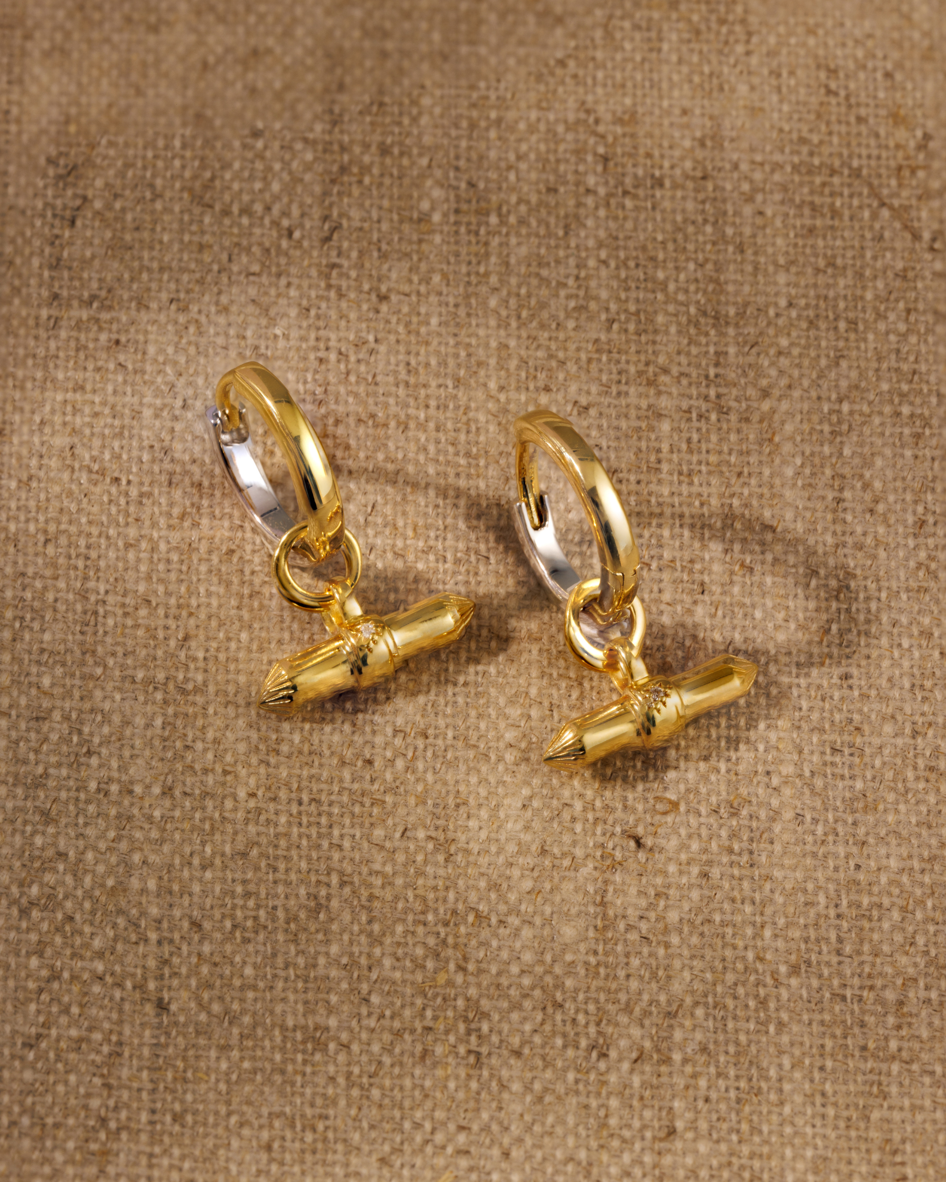 Lauren T-bar earring charms with crystal detail on Cara reversible gold and silver hoop earrings