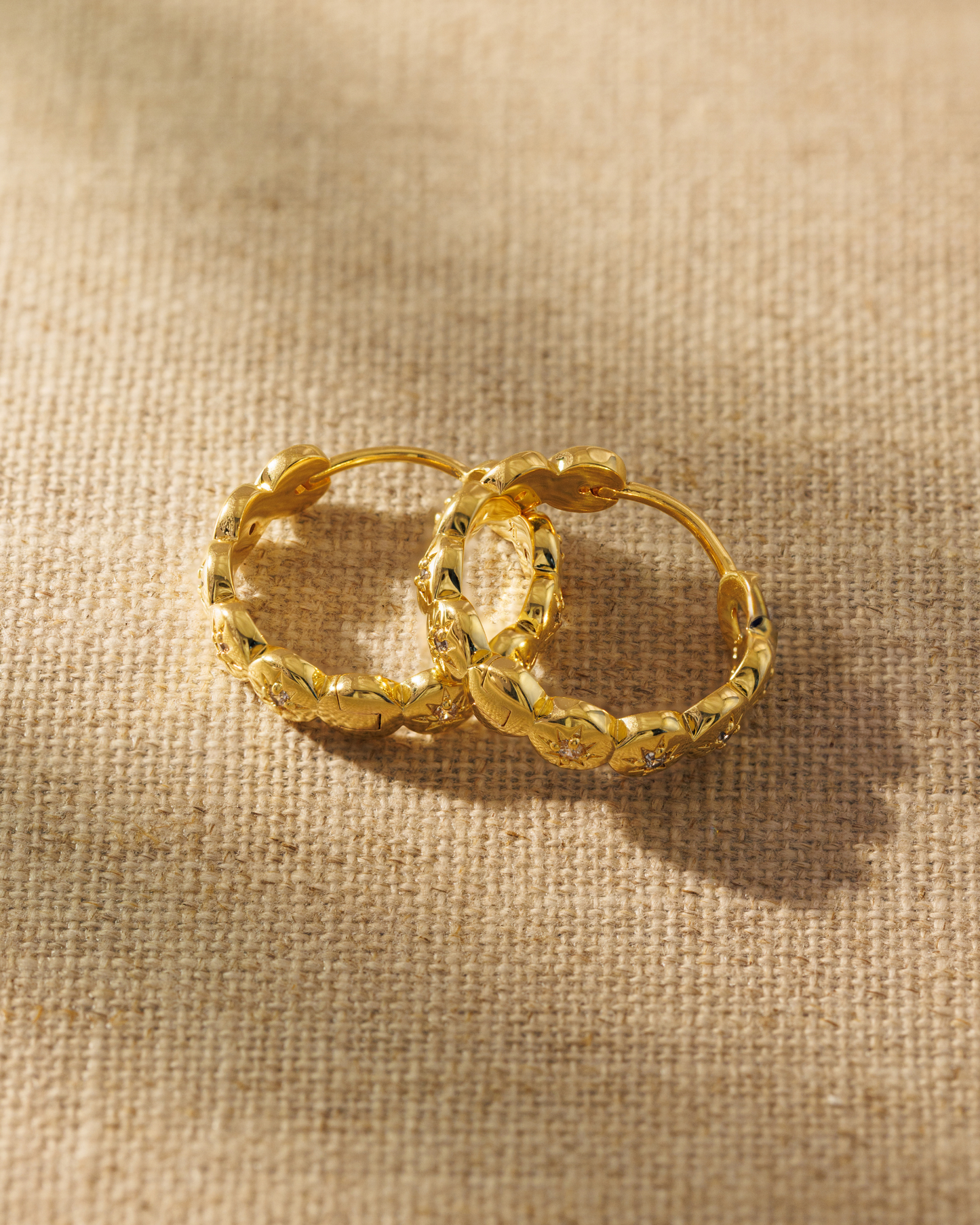 Raven James Layla Hoop Earrings in 18ct gold plated brass - vintage-inspired midi hoops with star-set cubic zirconia and hinge fastening