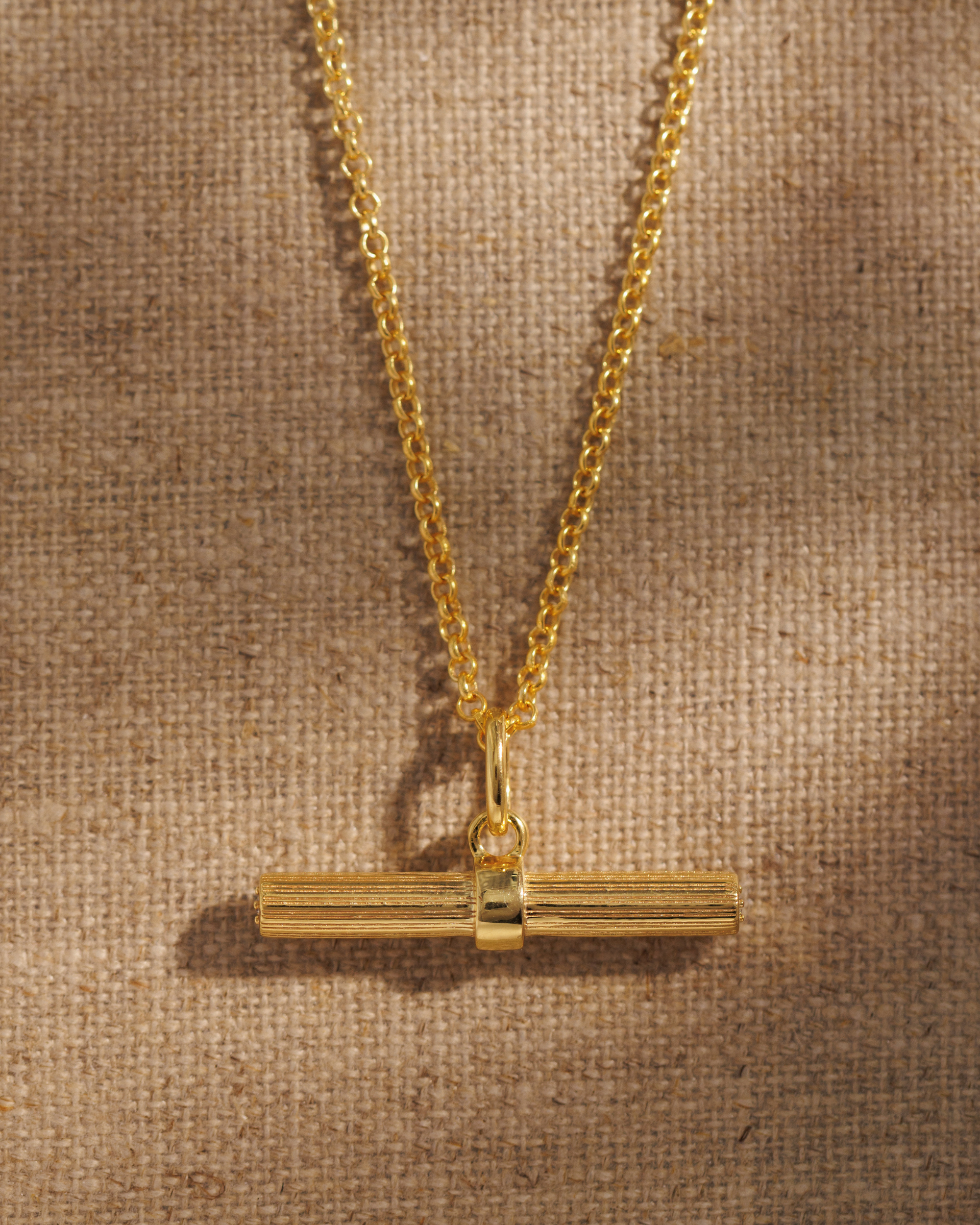 Lexi gold T-bar pendant styled on Ivy gold chain necklace