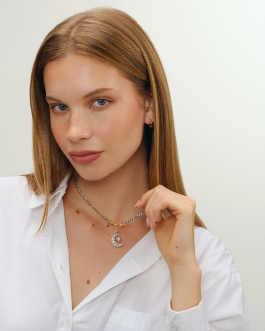 Silver moon pendant with pearls and brilliant cut crystals on model with River necklace