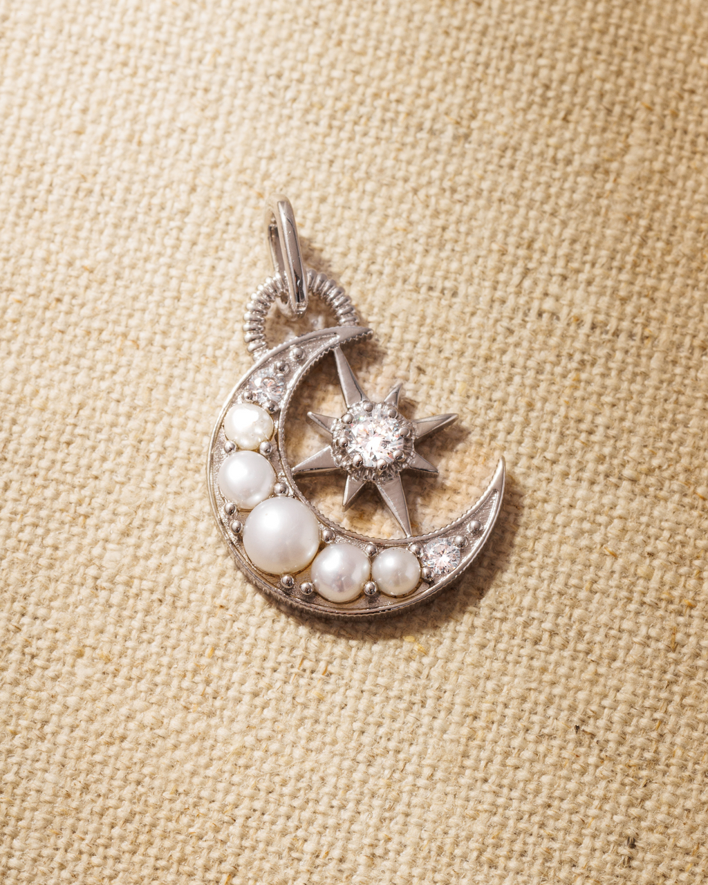 Silver moon pendant with pearls and brilliant cut crystals 