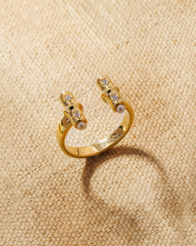 Gold open ring with T-bar ends, crystals and pearl detail