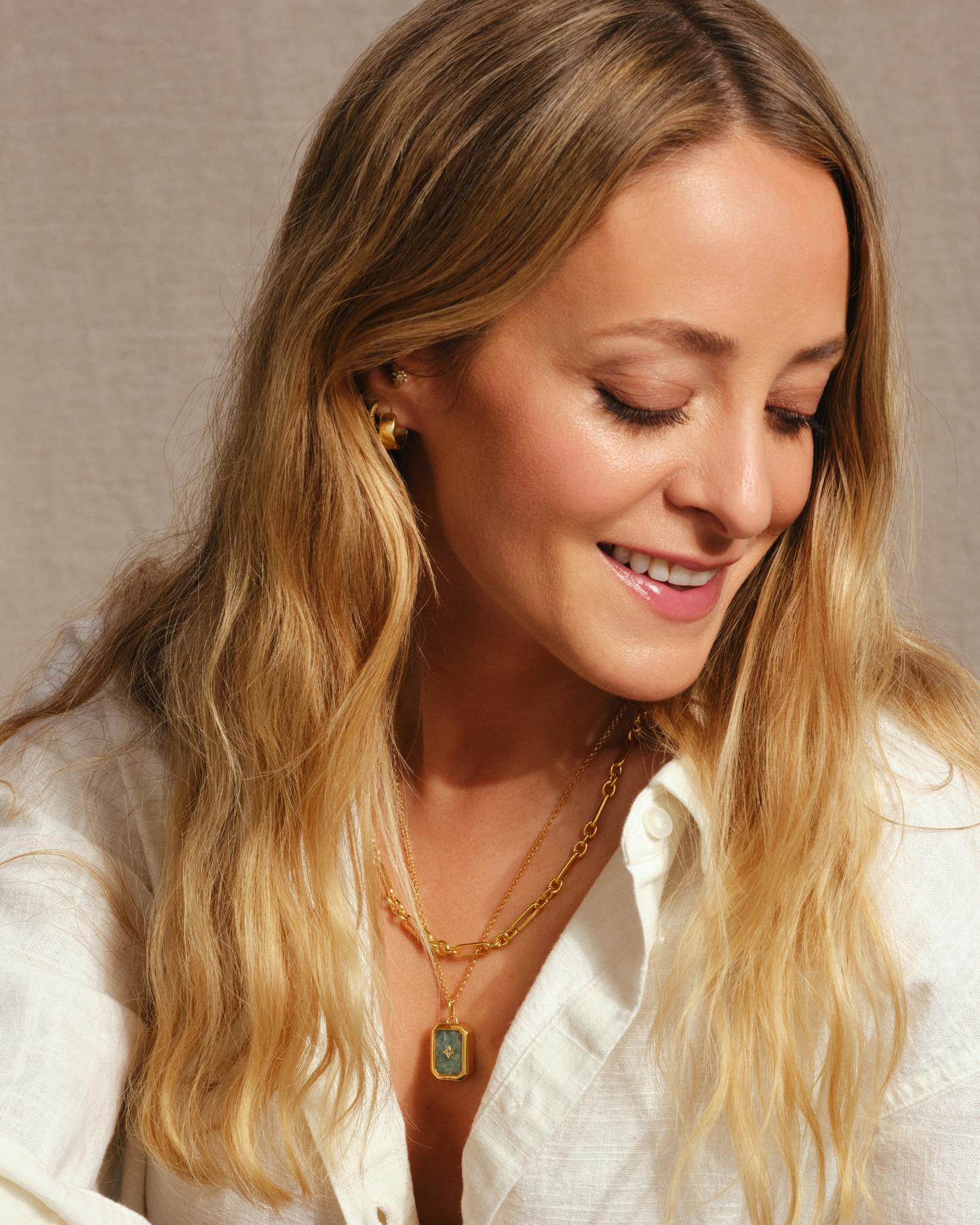 Moon talisman amazonite and gold pendant with crystal star detail on ivy gold chain, worn by Fleur styled with Tabitha