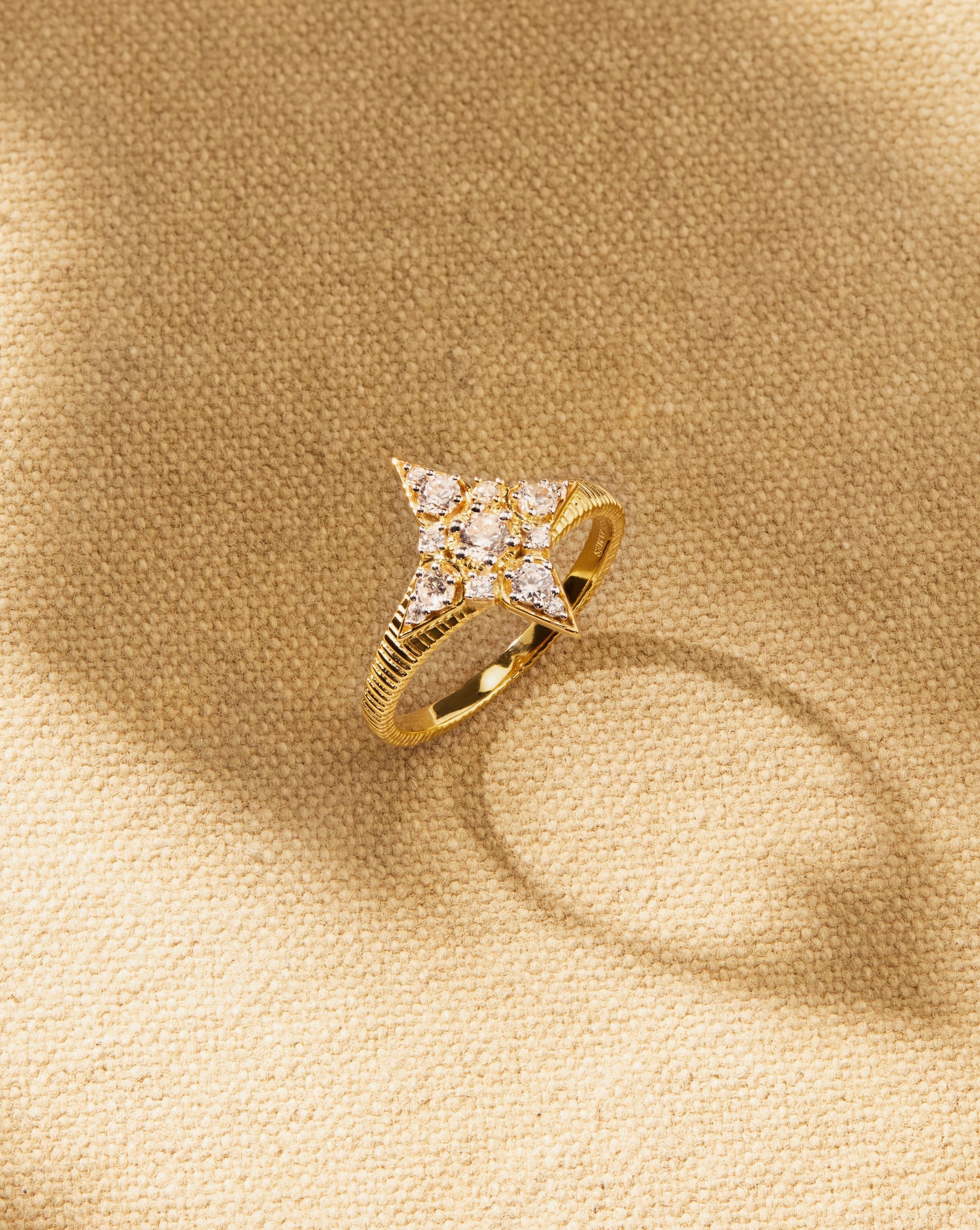 Nova gold vermeil star ring with brilliant cut crystal detail