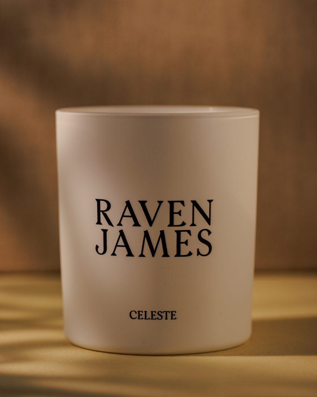 Raven James scented candle with peony, vetiver and amber fragrance