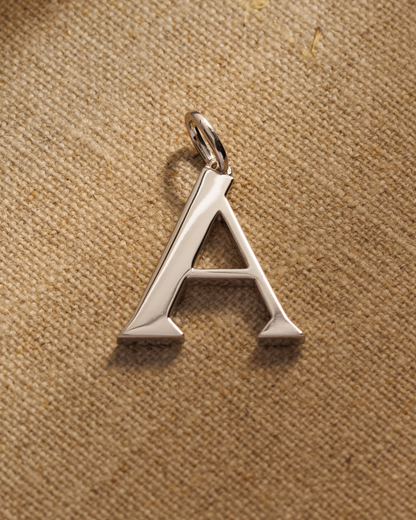 Solid silver alphabet initial pendants