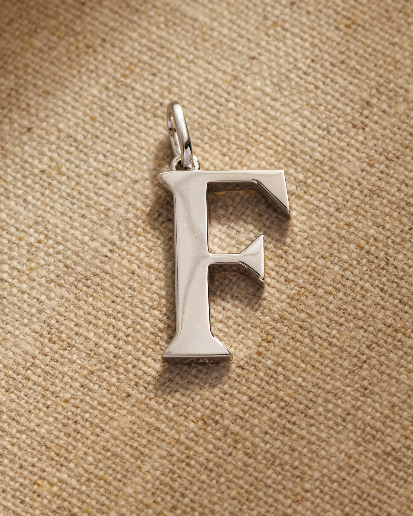 Solid silver alphabet initial pendants