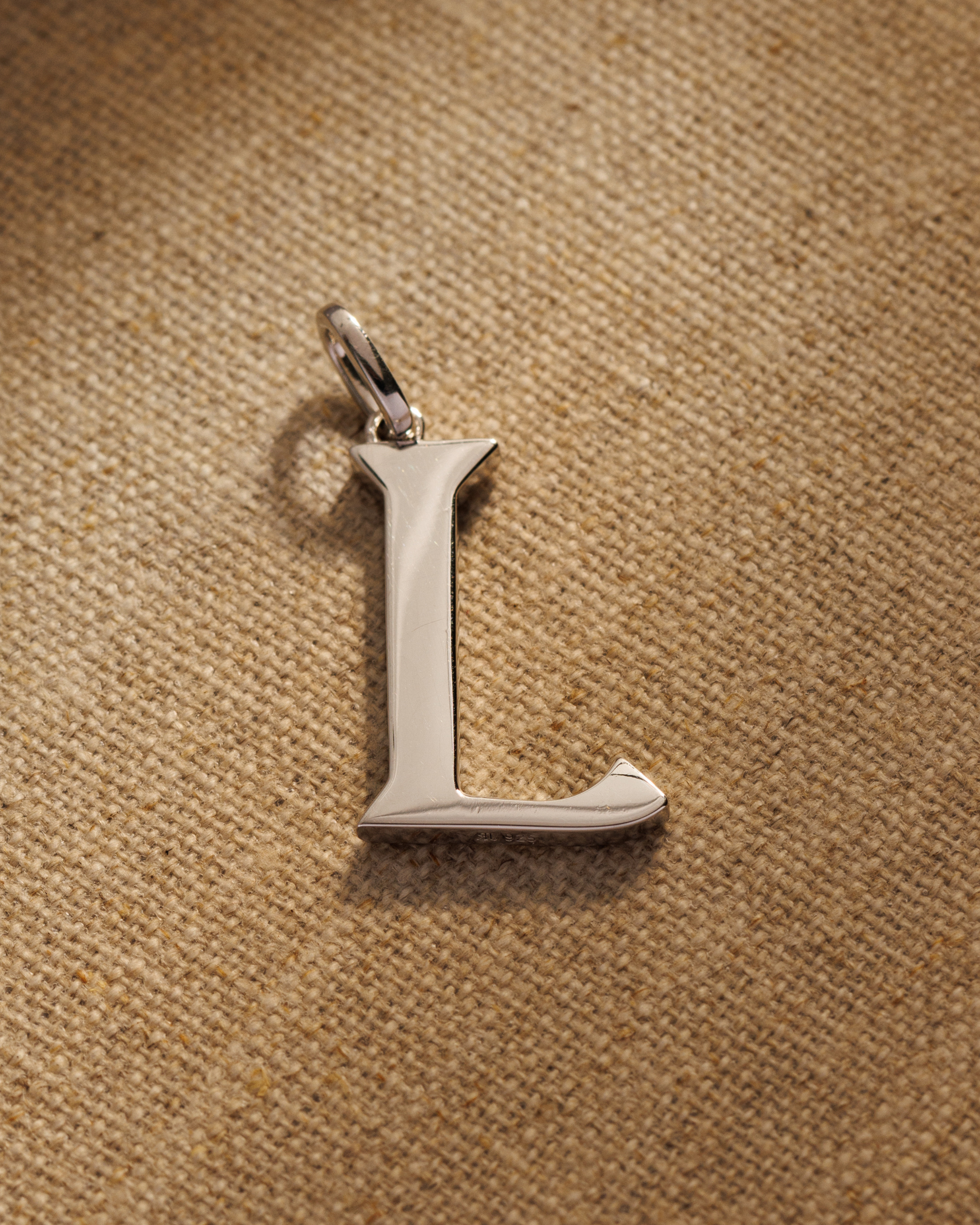Solid silver alphabet initial pendants