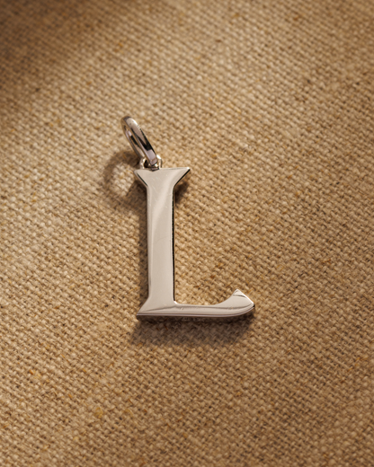 Solid silver alphabet initial pendants