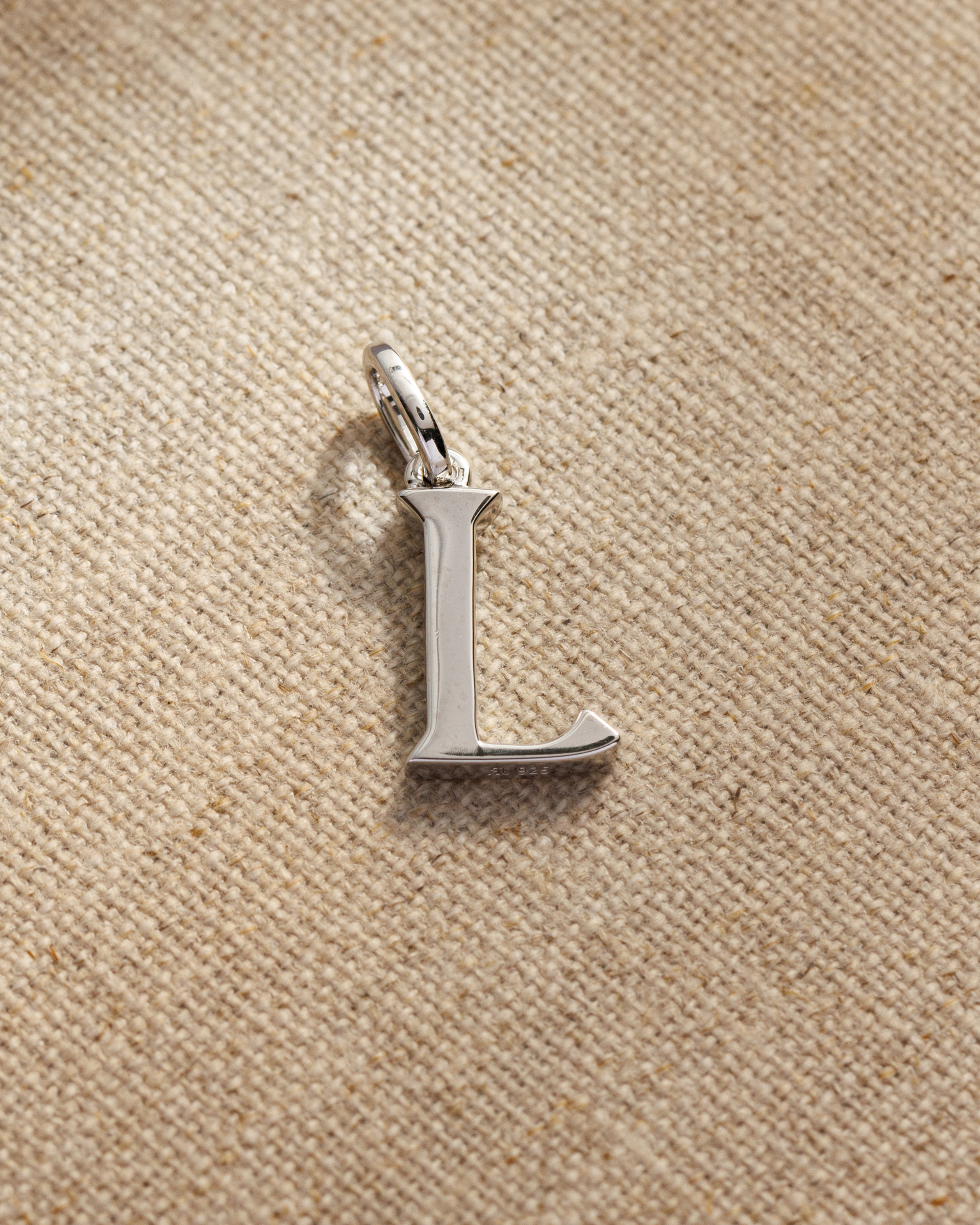 Solid silver alphabet initial pendants