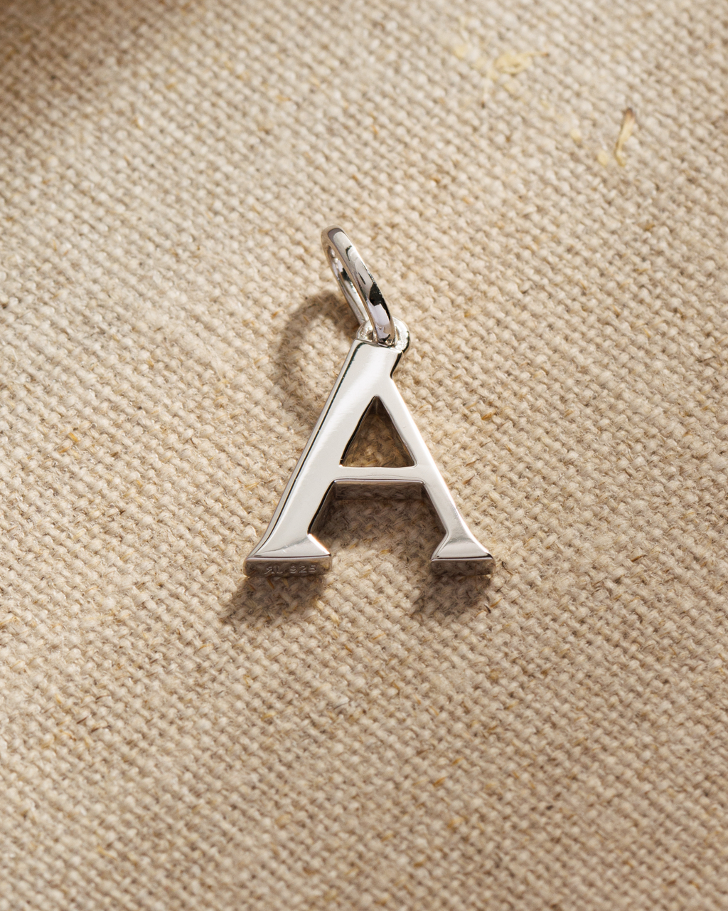 Solid silver alphabet initial pendants