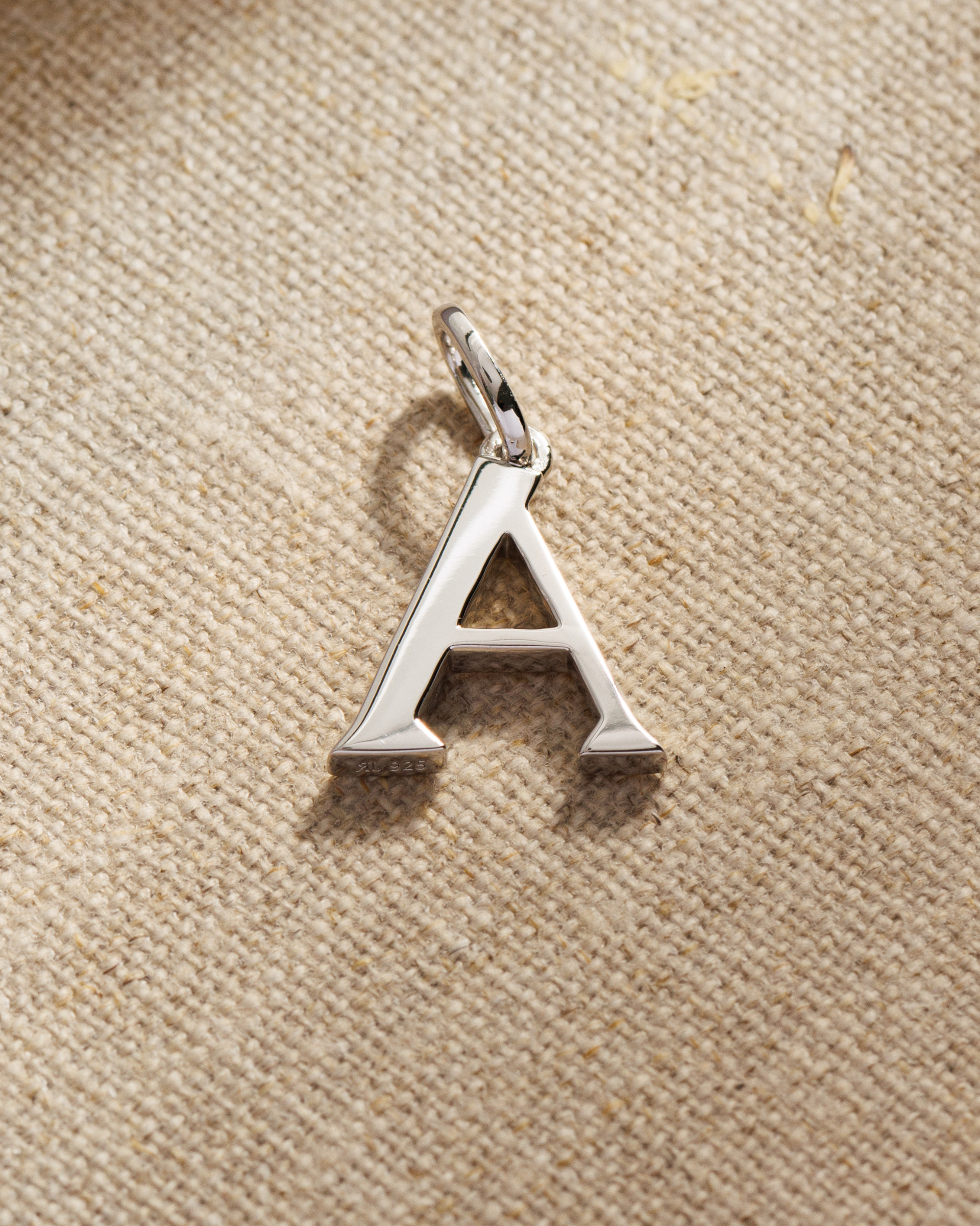 Solid silver alphabet initial pendants