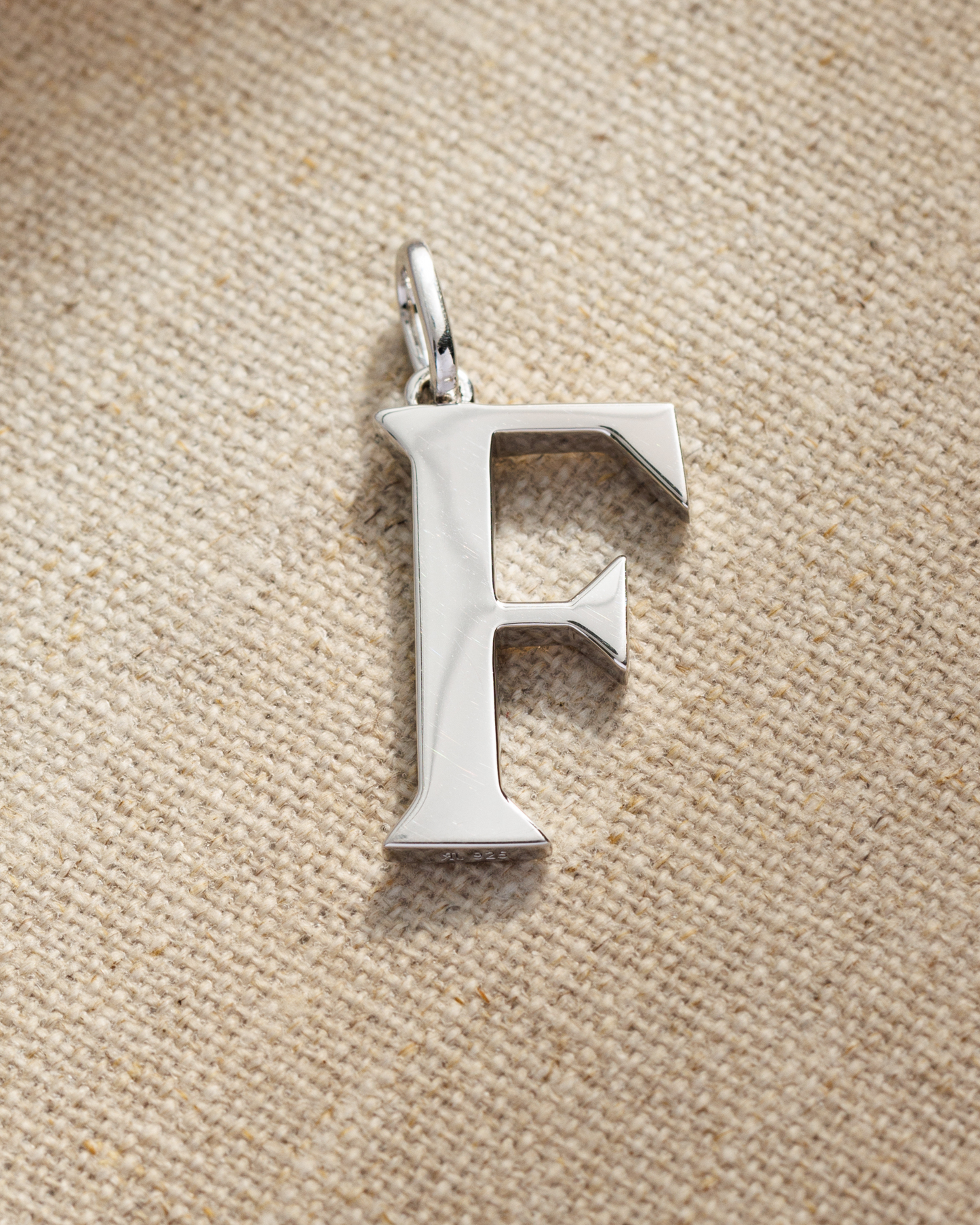 Solid silver alphabet initial pendants
