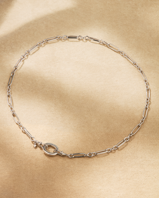 Silver paperclip chain necklace with oval clasp detail