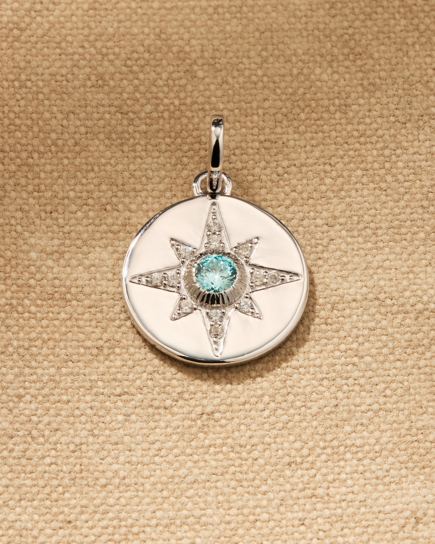 Vega silver disc pendant with vintage star motif and crystals