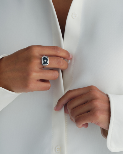 Silver statement ring with black onyx centre and crystal star detailing