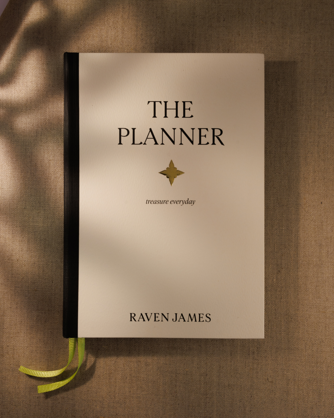 Raven James planner notebook with weekly and daily planning pages