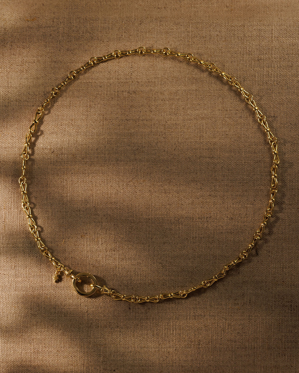 EADIE gold bow tie chain necklace