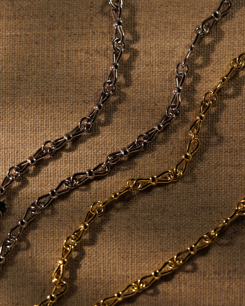 EADIE bow tie chains in gold and silver