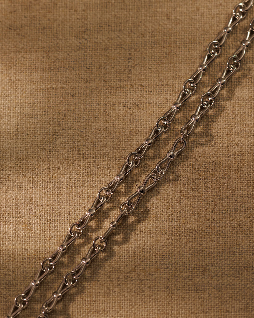 EADIE silver bow tie link chain necklace