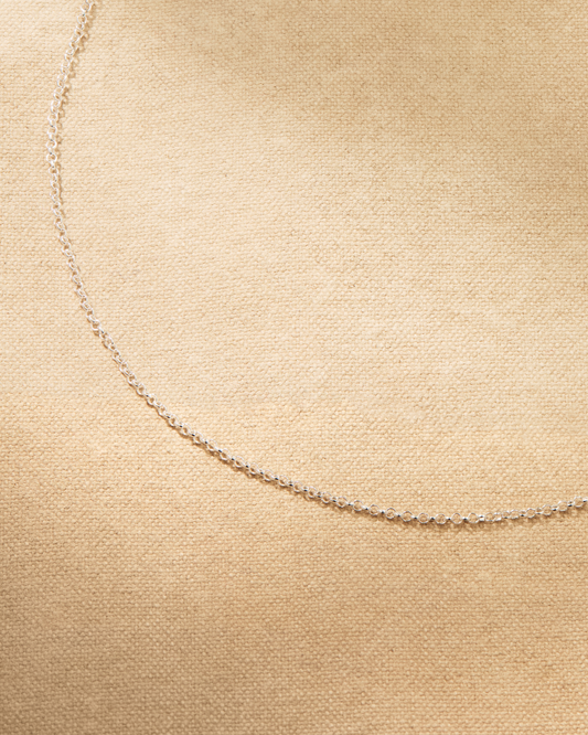 Ivy fine chain necklace in sterling silver with adjustable length, designed for layering and adding pendants