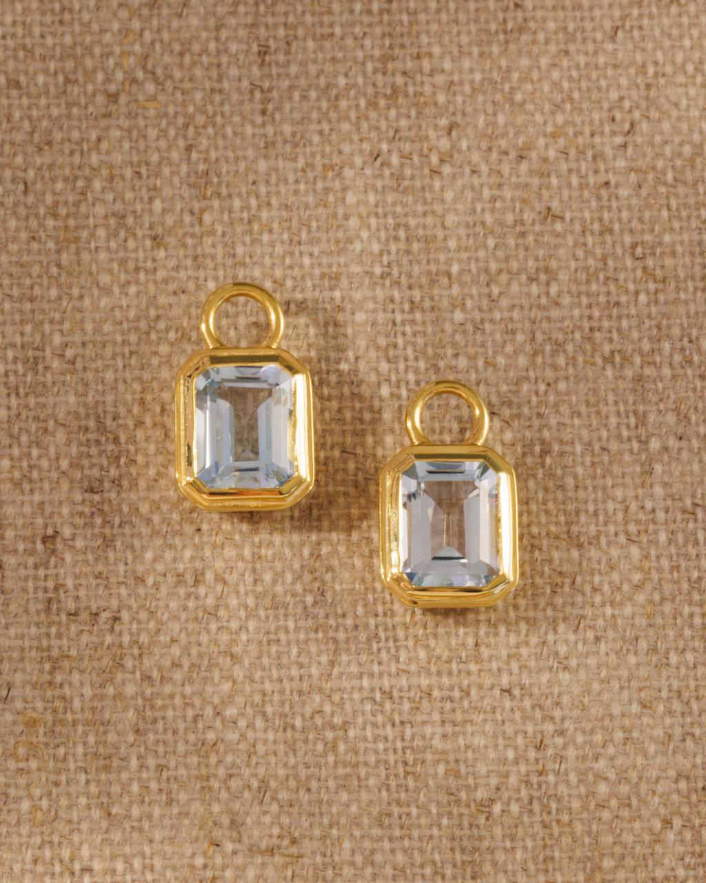 Lumi emerald cut blue topaz earring charm in 18ct gold plated bezel setting
