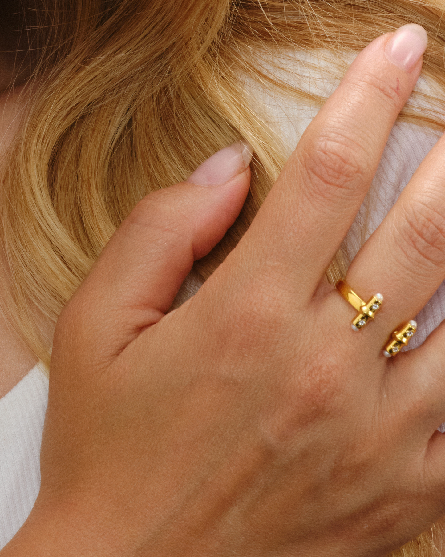 Gold open cuff ring with T-bar ends, crystals and pearl detail