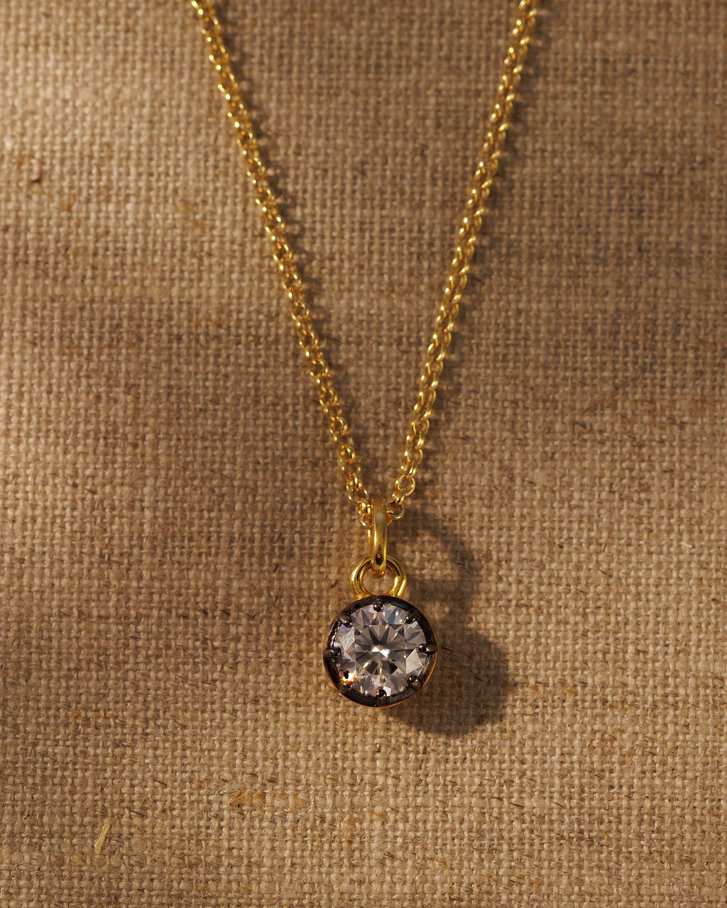 ODETTE round moissanite solitaire pendant on the gold IVY chain