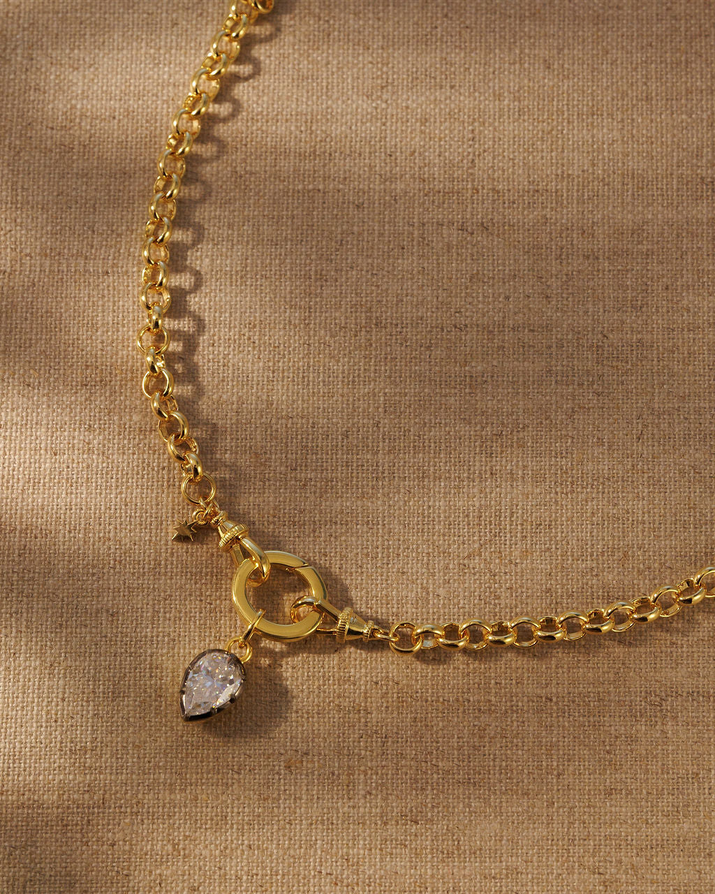 PIA pear moissanite pendant on the COCO round link chain