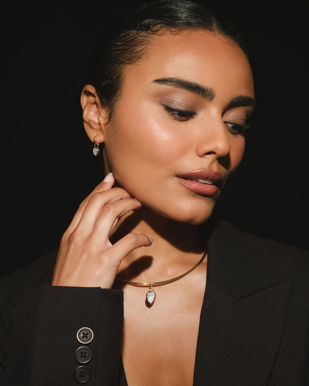 PIA pear moissanite pendant on the COLETTE gold torque
