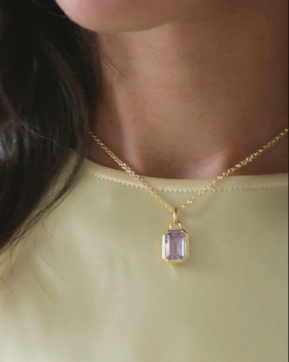 Lumi 18ct gold plated emerald cut pink amethyst pendant styled on an ivy gold chain necklace