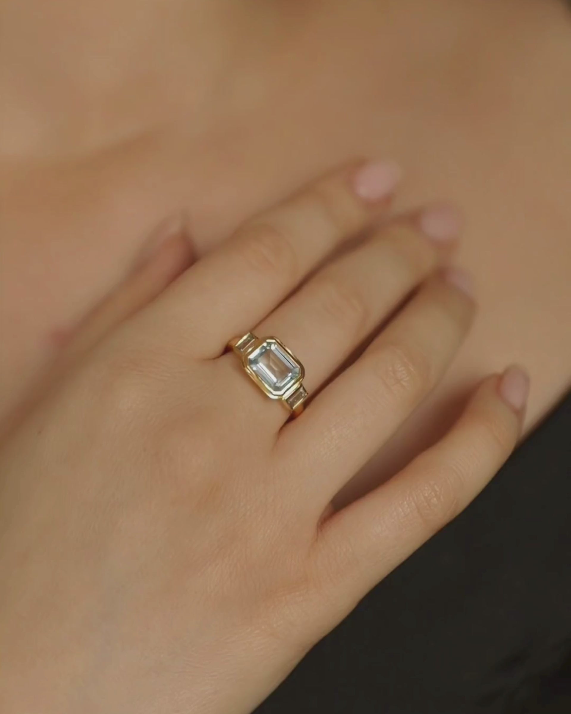 Lumi emerald cut blue topaz three stone ring in 18ct gold plated sterling silver