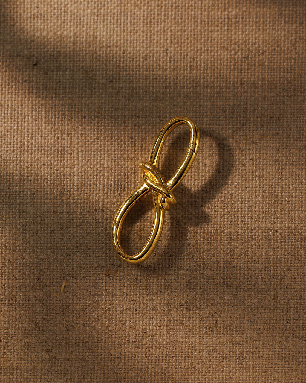 TRIXIE gold bow extender detail