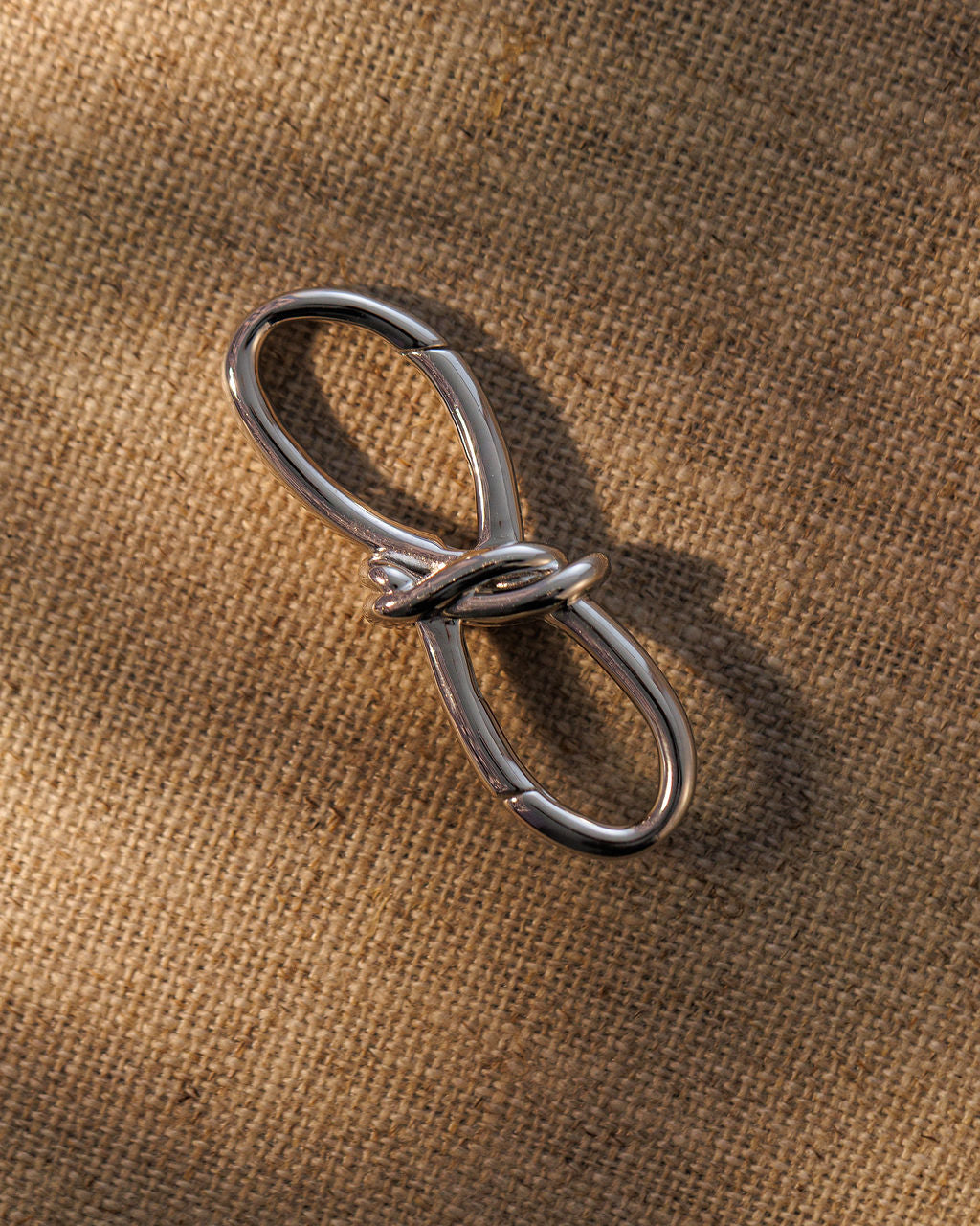 TRIXIE bow extender in sterling silver, side view